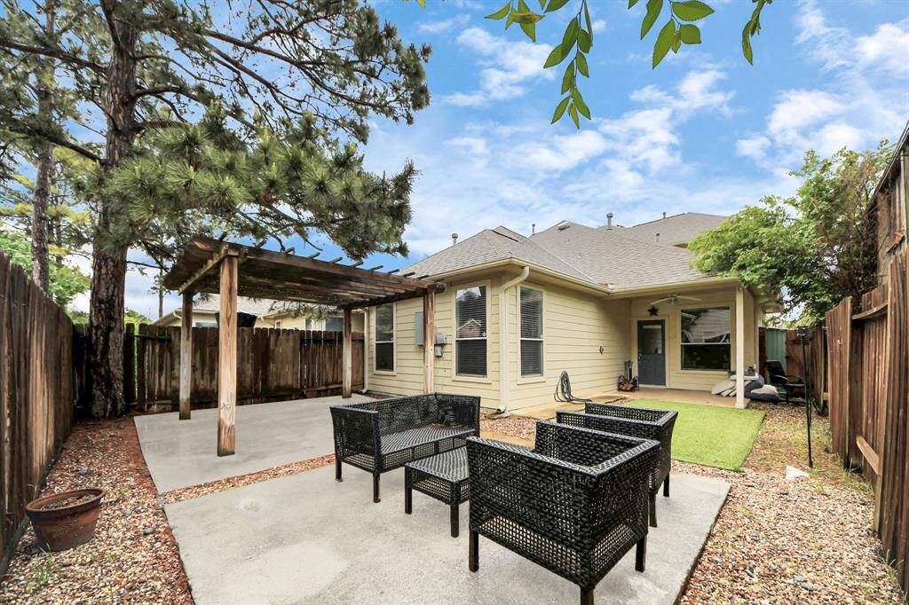 Inviting outdoor seating area, perfect for entertaining with comfortable seating and a relaxed atmosphere.
