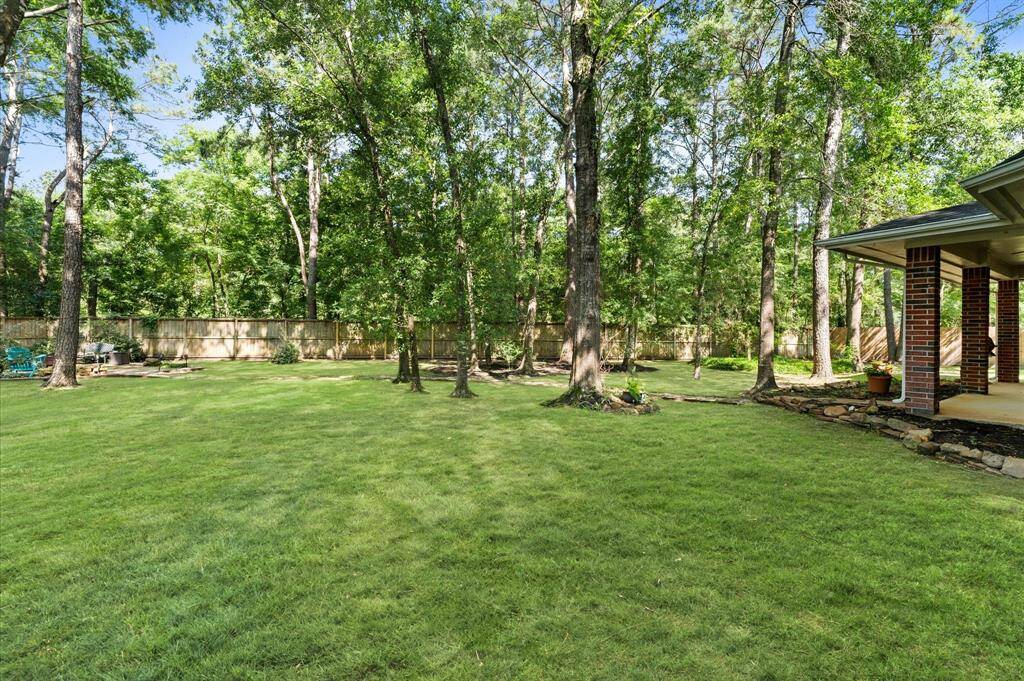 On almost 1/2 acre lot with no backyard neighbors.