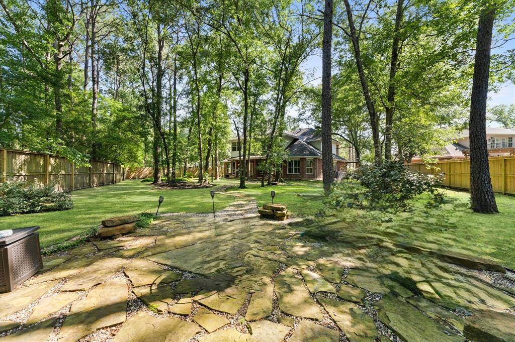 This backyard is perfect for outdoor living and relaxation.