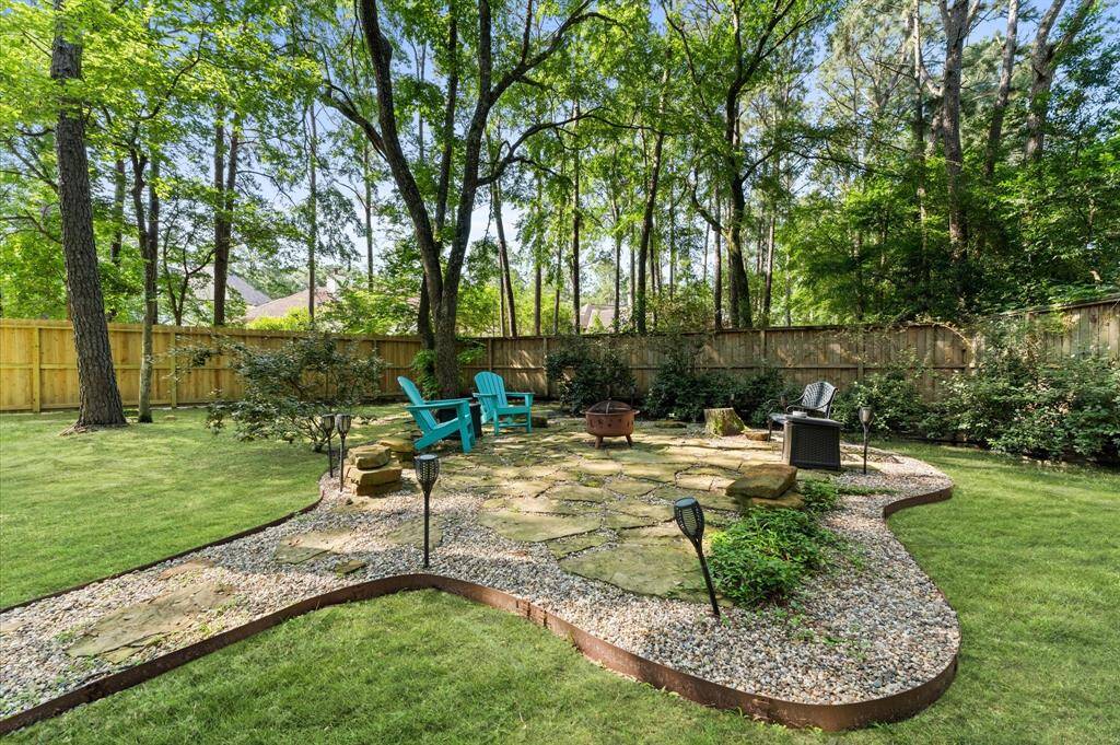 This backyard is perfect for outdoor living and relaxation.