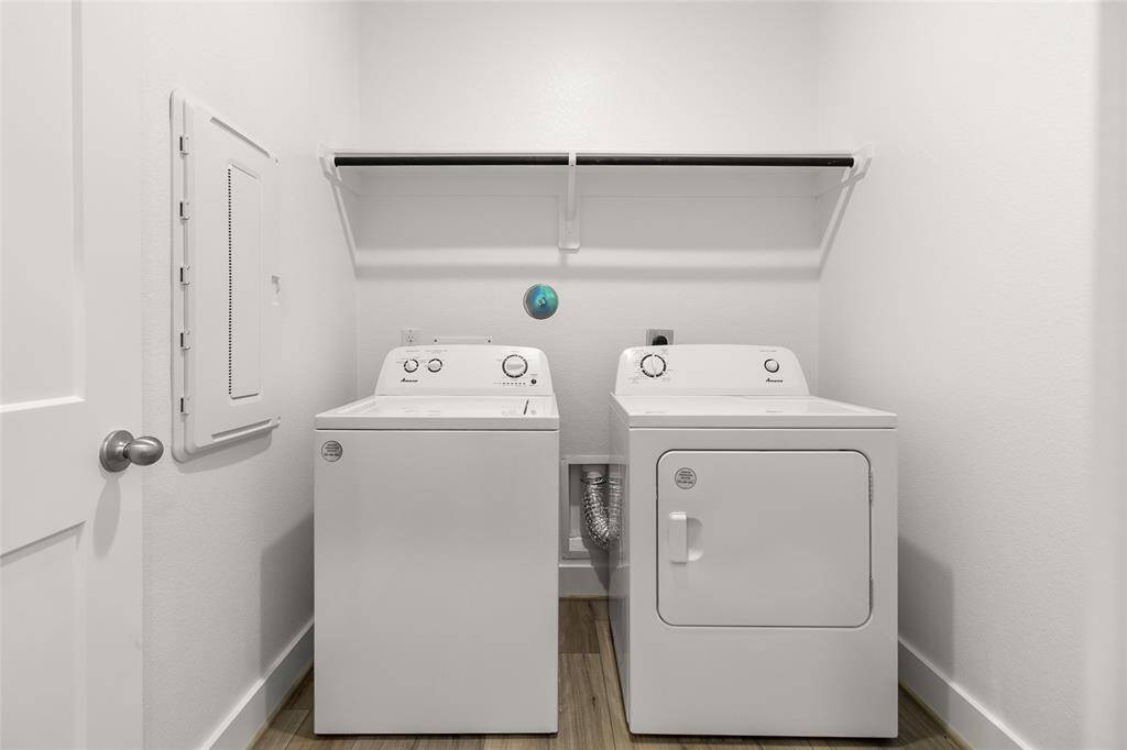 Whether you're sorting through the week’s clothes or prepping for a family gathering, this laundry room is designed to be a cheerful and functional part of your home, where every wash feels like a fresh start.