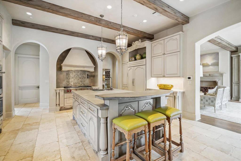French-inspired kitchen design featuring Wolf, SubZero, and Bosch appliances.