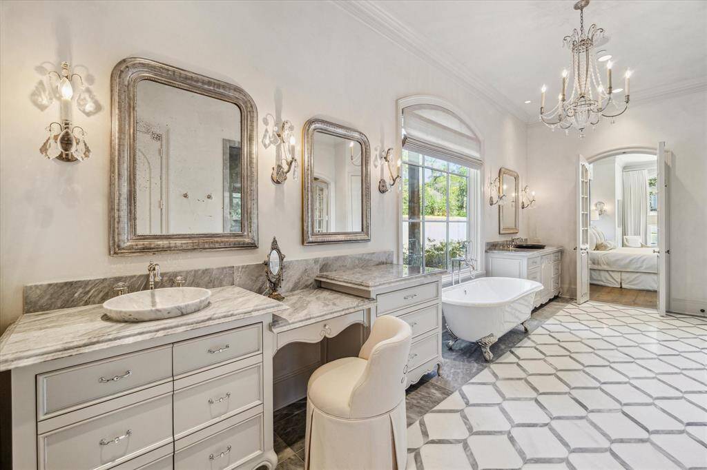 Double doors lead into this luxurious space.