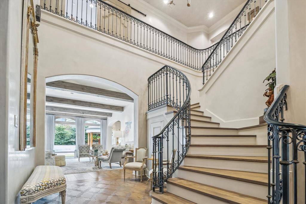 Gorgeous stairway leading to the second floor or you can use the ELEVATOR just across hall.