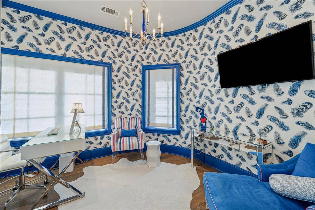 The upstairs study is a light filled space with nice storage.