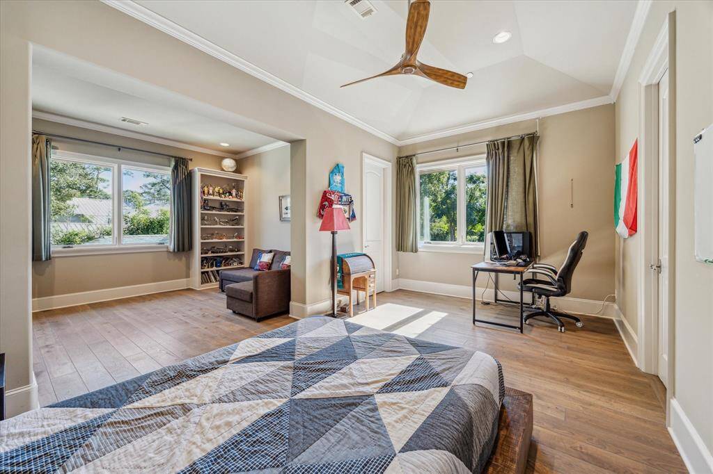One of three secondary suites with private sitting area, separate bath and two closets.