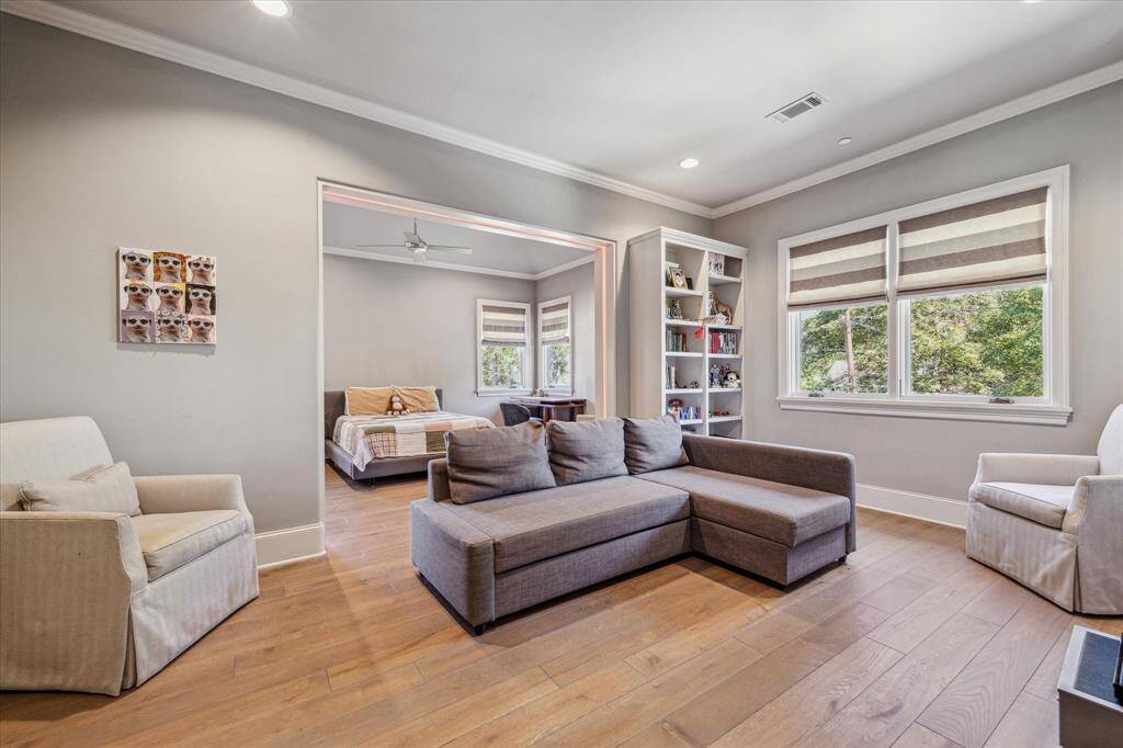 Second luxurious suite with private living space and bedroom.