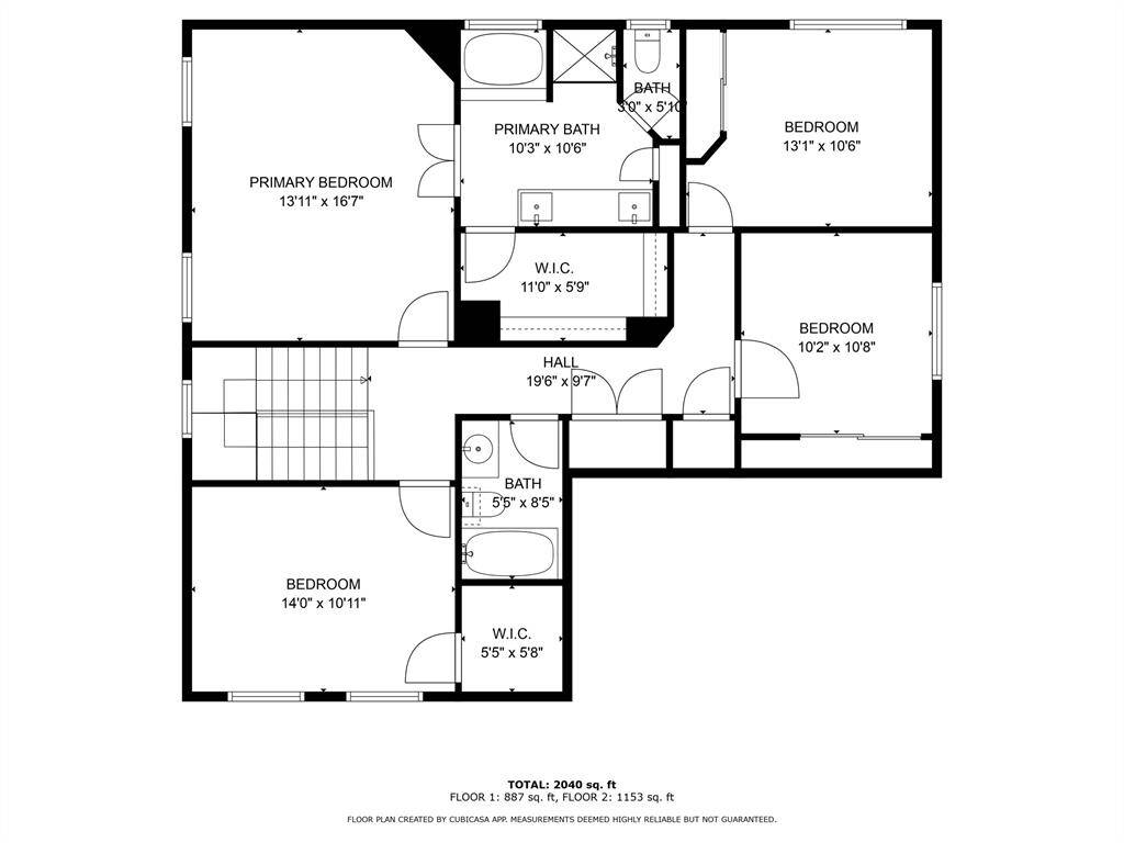 This floor plan features four bedrooms, including a spacious primary suite with an attached bath and walk-in closet. There's an additional full bath, a second walk-in closet, and a central hall connecting all rooms. Ideal for a family seeking ample space.