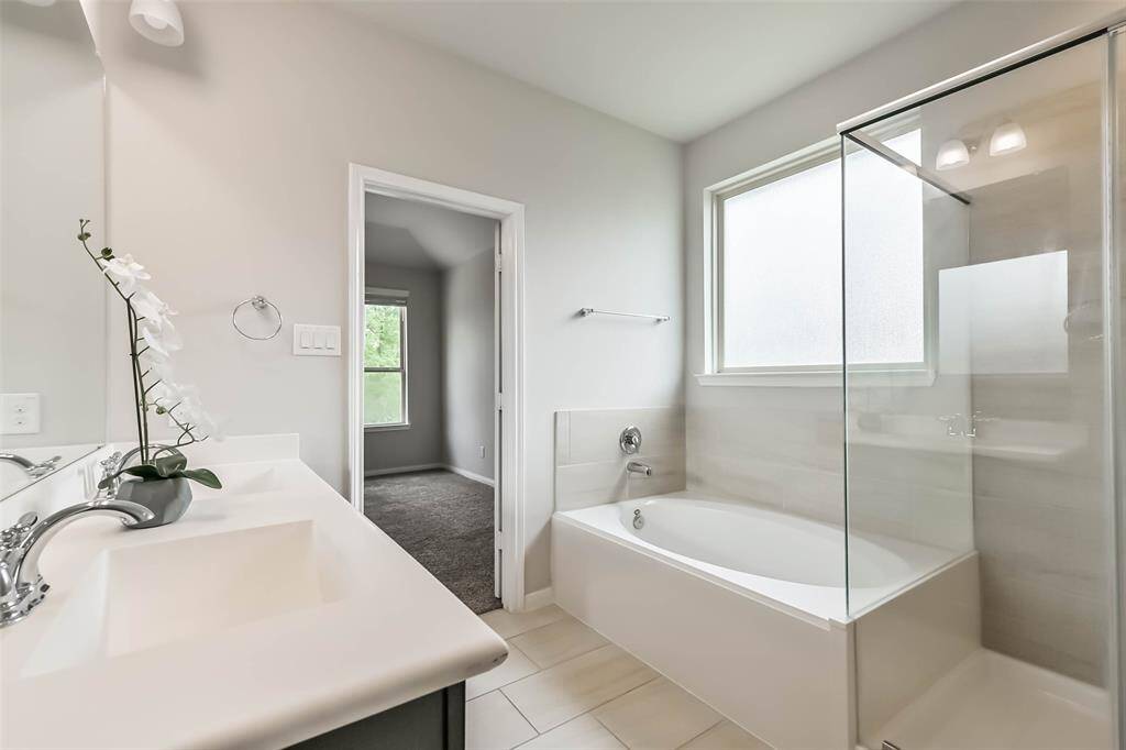 Lots of natural lighting in master bath.