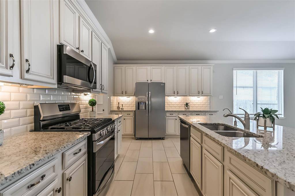 Refrigerator included. Granite Countertops. Gas cooktop.