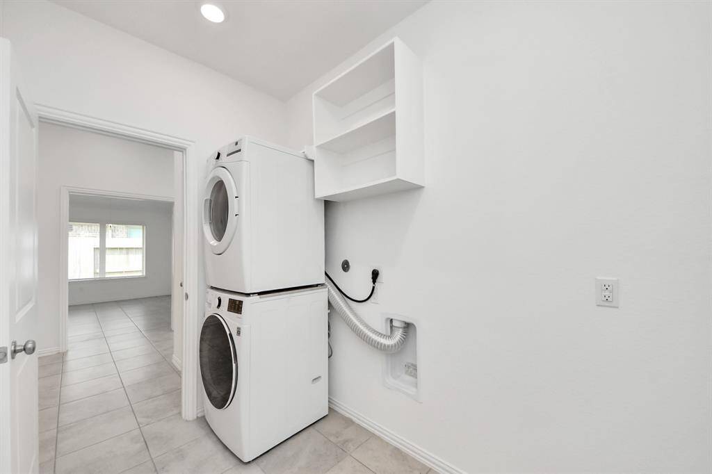 Huge Laundary Room big enough to add another refrigerator.