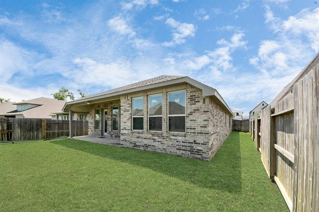 Spacious backyard perfect for outdoor living and entertaining.