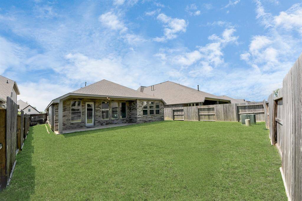 Expansive backyard perfect for outdoor activities and relaxation.