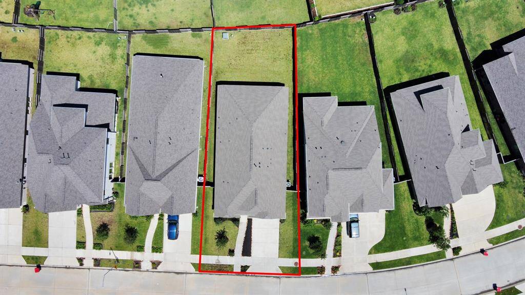 Explore this beautifully positioned lot from above, highlighting its spacious layout and prime location within a charming neighborhood.