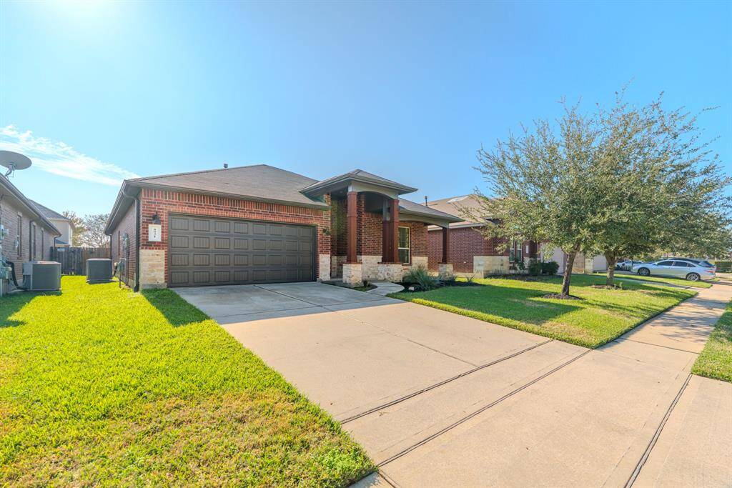 This home offers attractive curb appeal with a well-maintained exterio