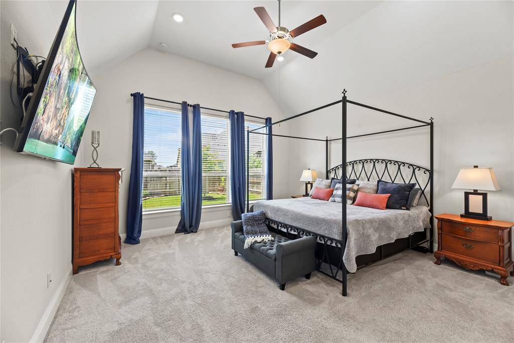 How perfect is this primary suite? Spacious and filled with natural light, this serene retreat offers the ultimate escape, promising comfort, tranquility, and pure relaxation.