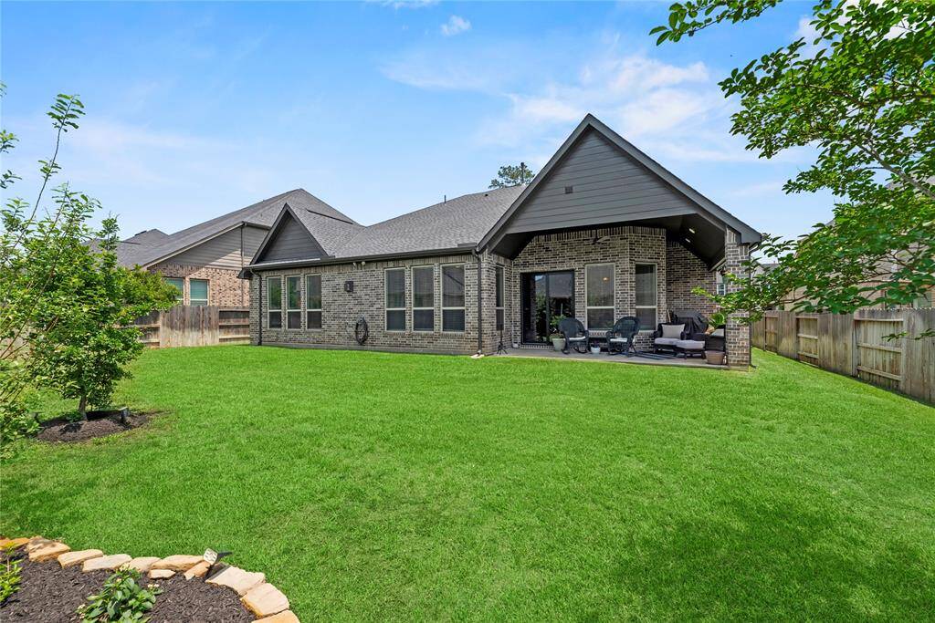 This spacious yard offers endless possibilities for creating cherished memories in the great outdoors.