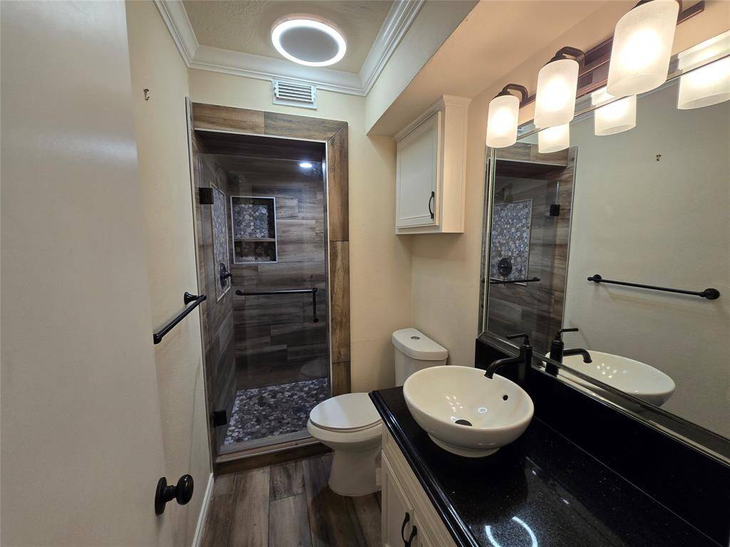 View of the Master bathroom in the first floor.