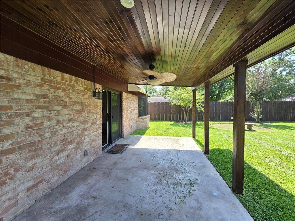 Wood floor in the ceiling of the cover patio