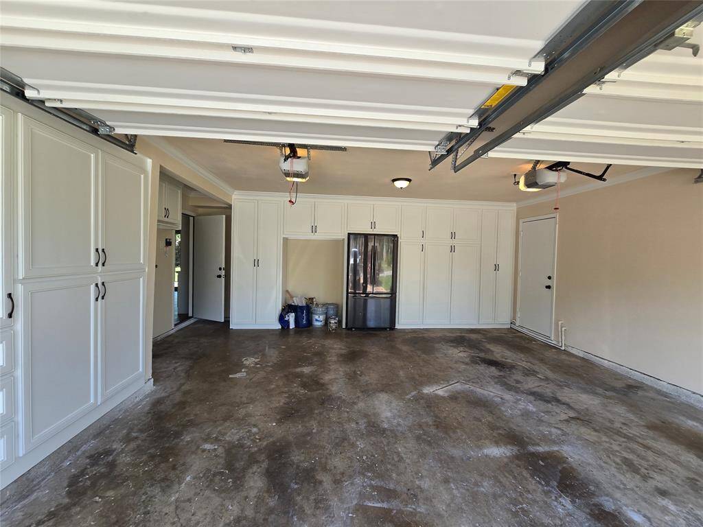 Garage with water softer.