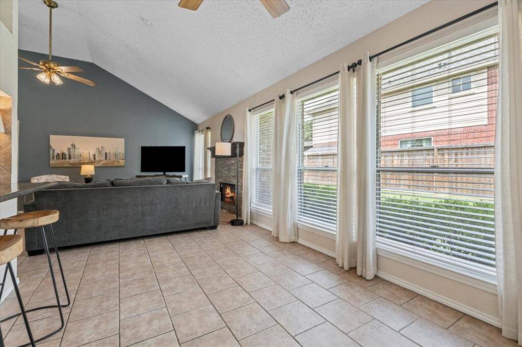 Enjoy your morning coffee in this charming breakfast nook, or use it as additional seating that flows seamlessly from the living room.