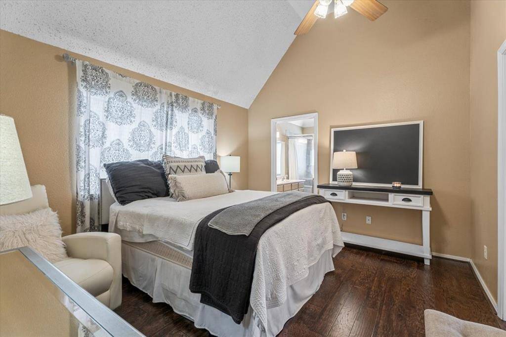 The primary bedroom offers a peaceful retreat, complete with a massive walk-in closet for all your storage needs.