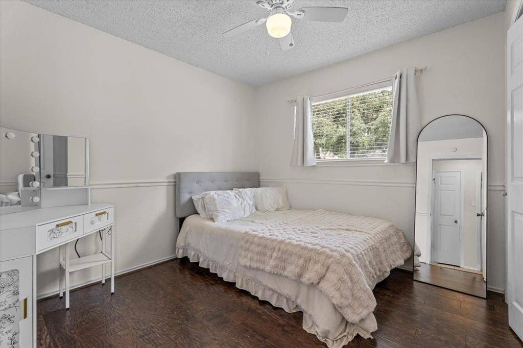 With no shortage of bedrooms in this home, this generously sized room offers plenty of space and versatility.
