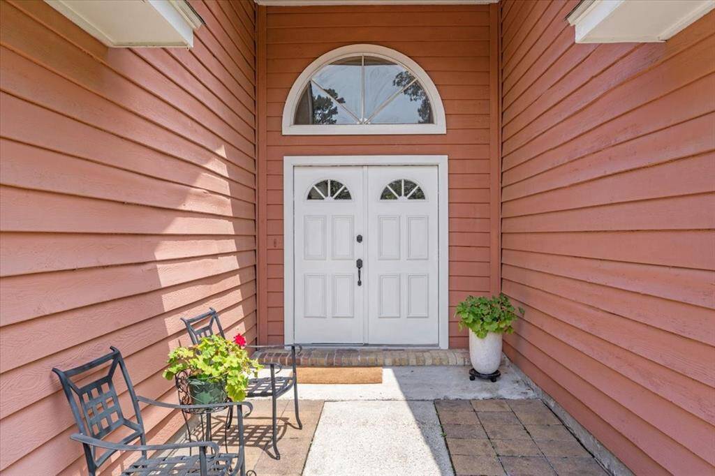 This warm and inviting entryway exudes charm and instantly makes you feel at home.