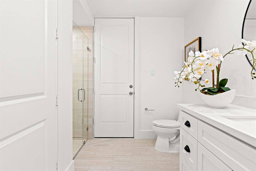 Featuring a full bath on the main floor with a walk in shower.