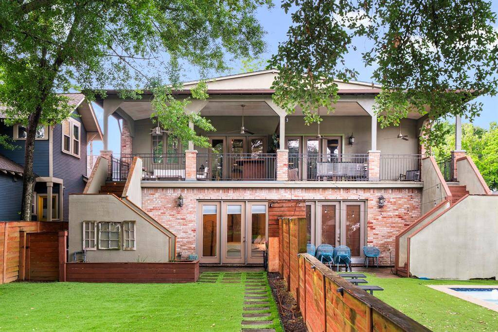 Zoned to acclaimed Harvard Elementary, this loft-style townhome blends rich history with modern luxury.