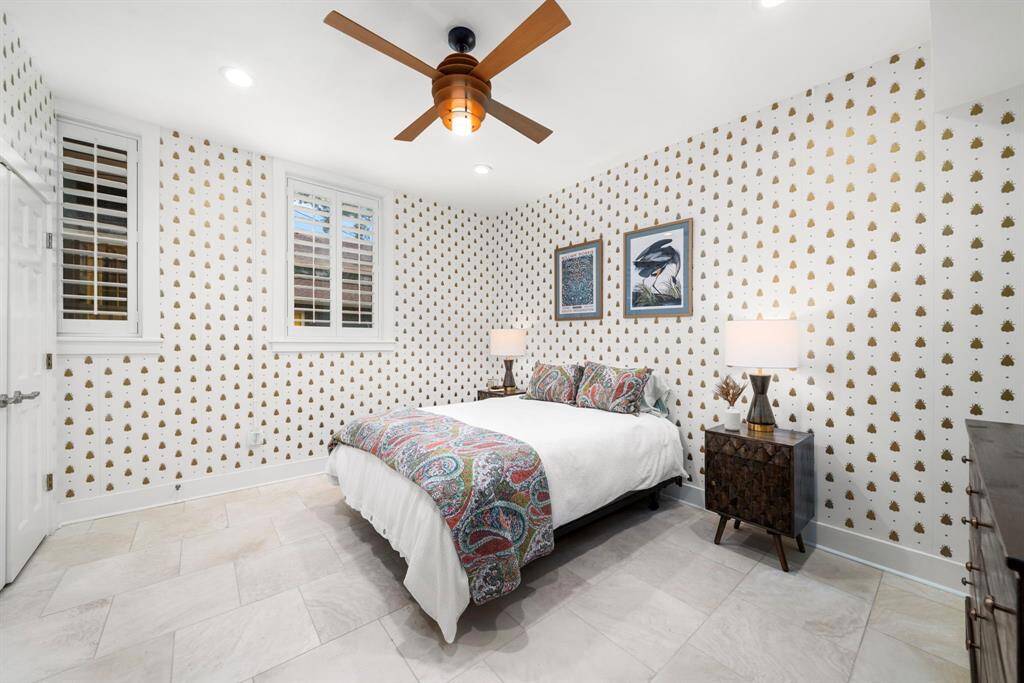 Bedroom #2 features gorgeous wallpaper.