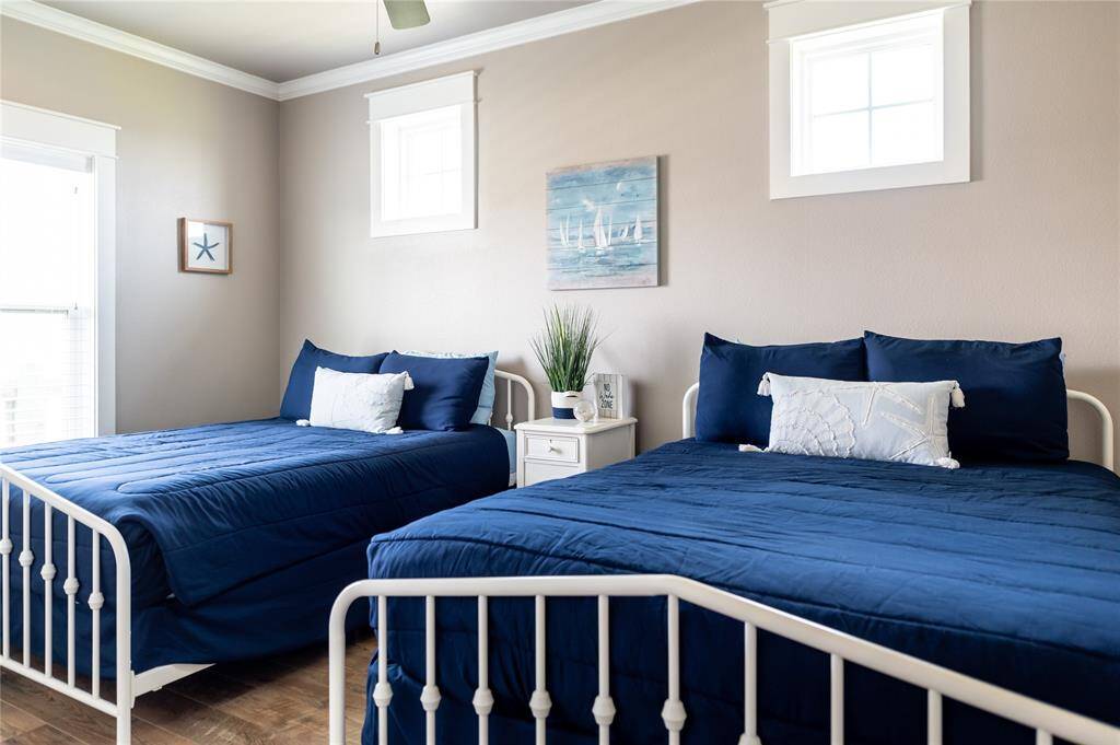 The secondary bedrooms easily accommodates two queen beds - furniture included!