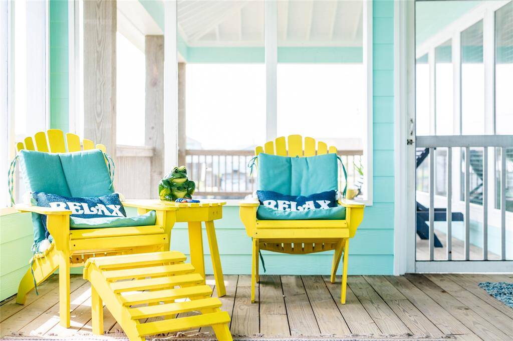 Enjoy your morning coffee in your semi-screened in porch with peek-a-boo views of the ocean! FURNITURE INCLUDED!
