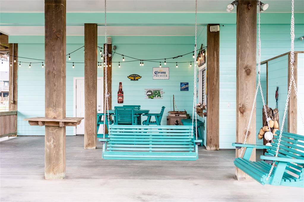 Swing along with the coastal breeze - all patio furniture is included!