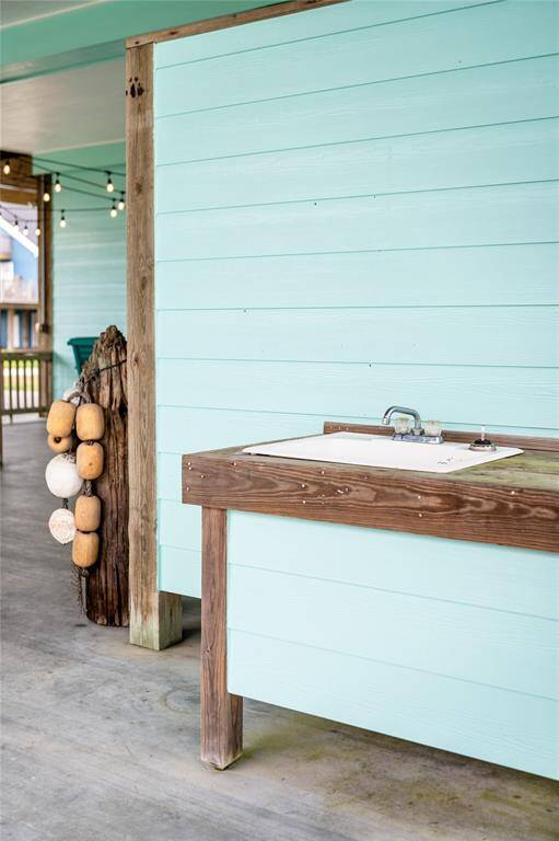 A fish cleaning sink & outdoor shower are ready and waiting after a day at the beach!