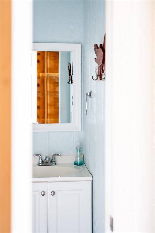 The half bath downstairs is perfect for entertaining and hanging out!