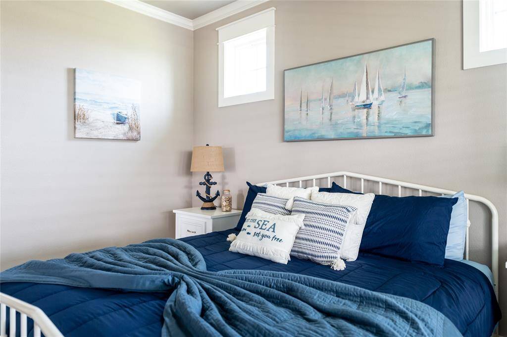 The primary bedroom is spacious and bright! Furniture & decor included!