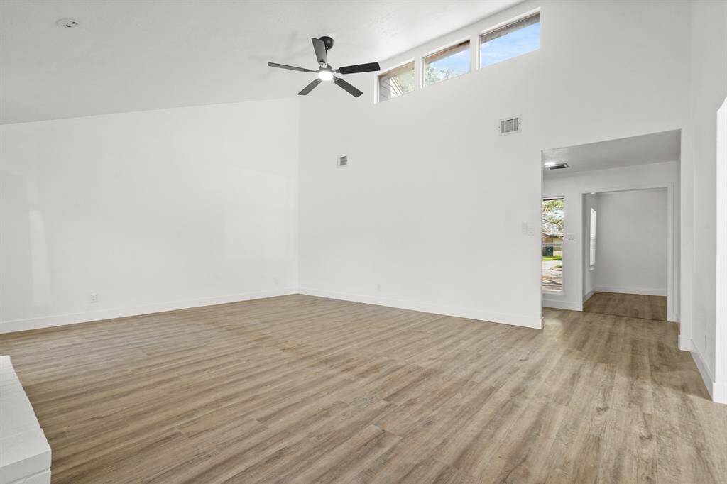 Very open living room with view of the entry