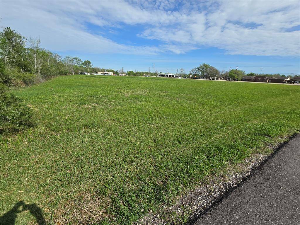 LOOKING ACROSS BACK OF PROPERTY