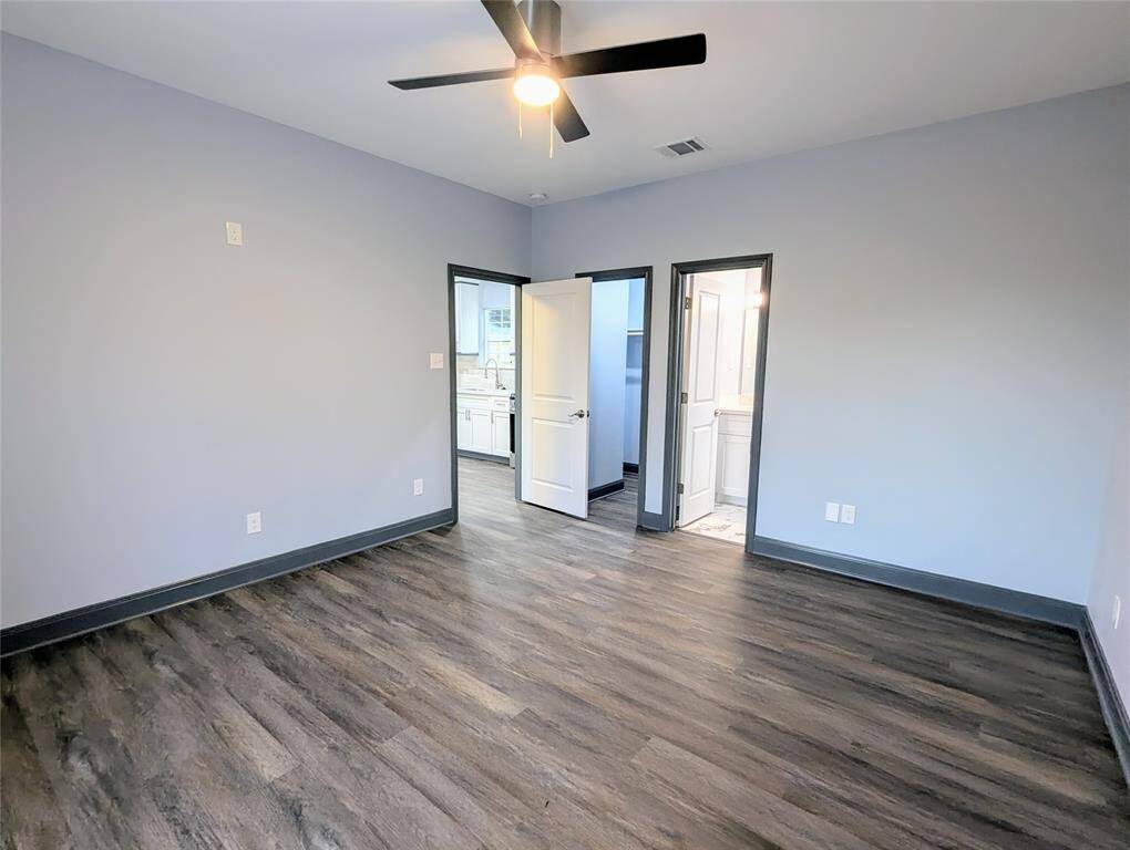 Spacious primary suite with a walk in closet