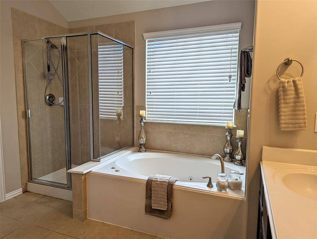 Separate tub and shower.