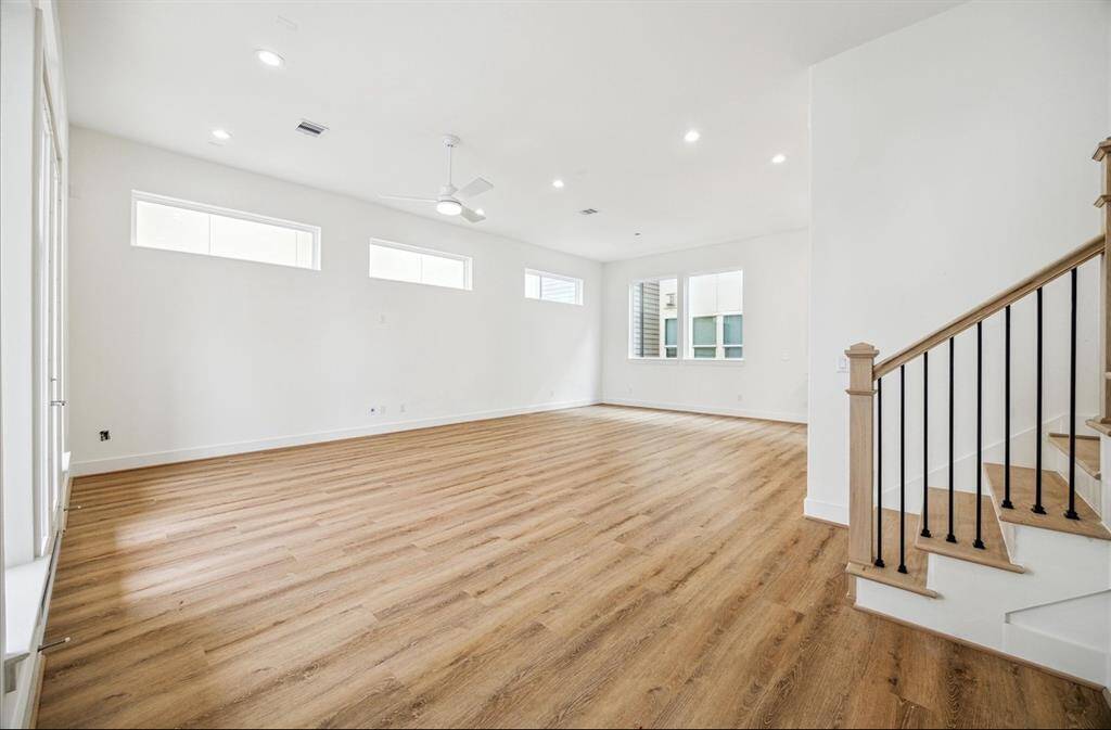 A view from your kitchen into your living area. This home boasts a huge covered terrace on the second floor off your living area.