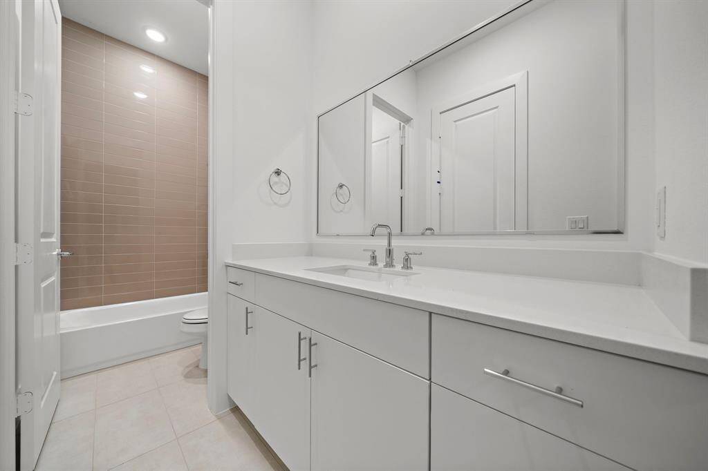 A beautiful inviting front entrance with extra storage.