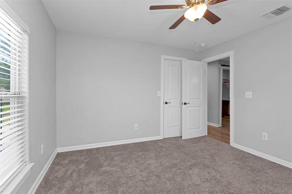 One of two secondary bedrooms