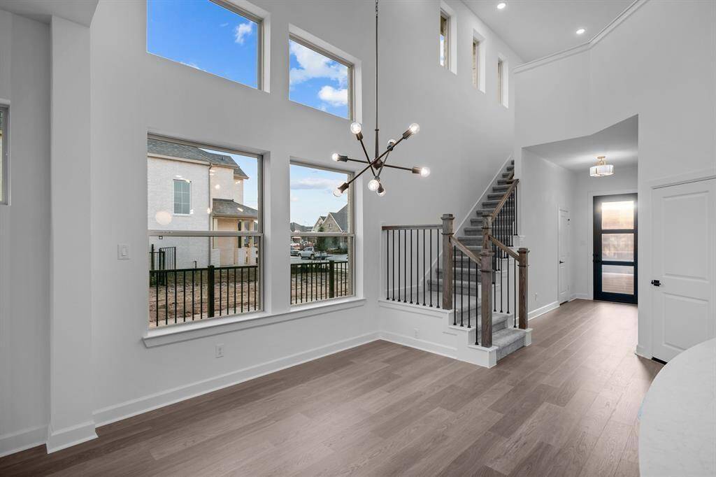 Soaring ceilings, modern design....and did we say...Never Lived In!!