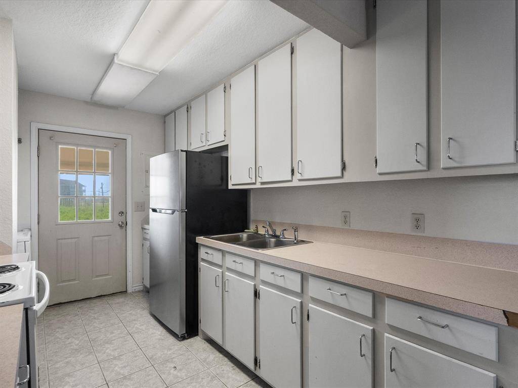 Upstairs you enter through the kitchn