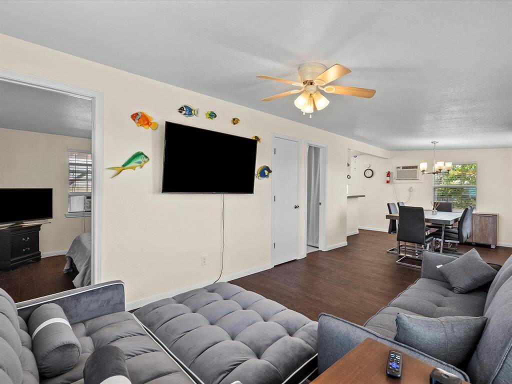 The living area opens to the dining area