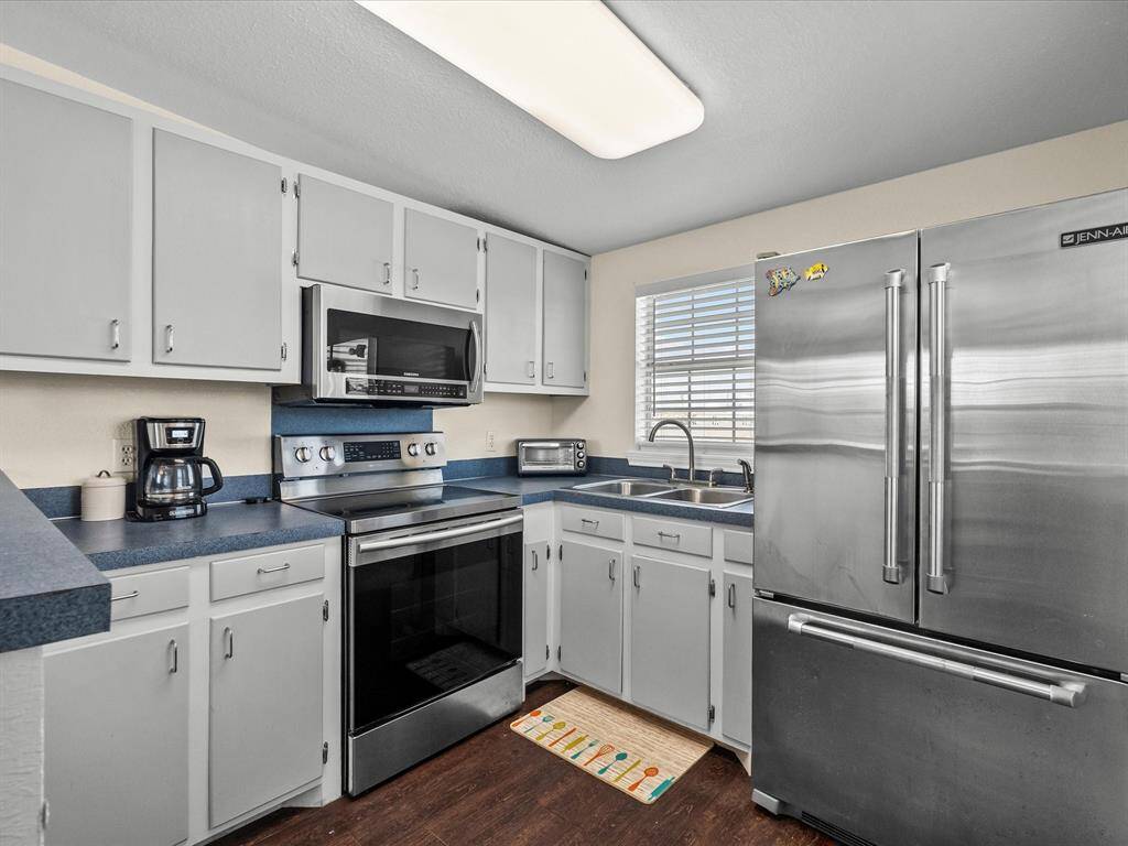 The kitchen is off the dining area