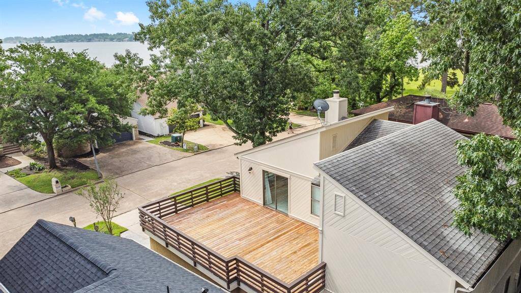 Welcome home to 11410 Twain! Nestled beneath a canopy of mature shade-trees, this character-rich home boasts beautiful lake views and timeless charm.