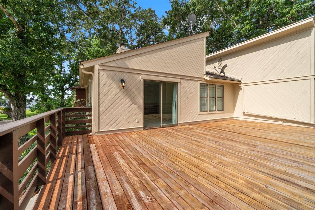 With ample room for outdoor dining, lounging, and social gatherings, the deck becomes a true extension of your living space.  Enjoy beautiful sunsets and views of Lake Conroe!